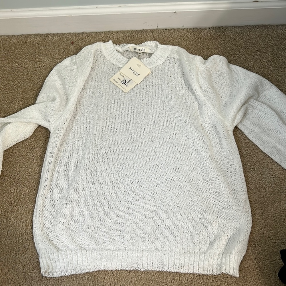 White sweater. Size M/L.